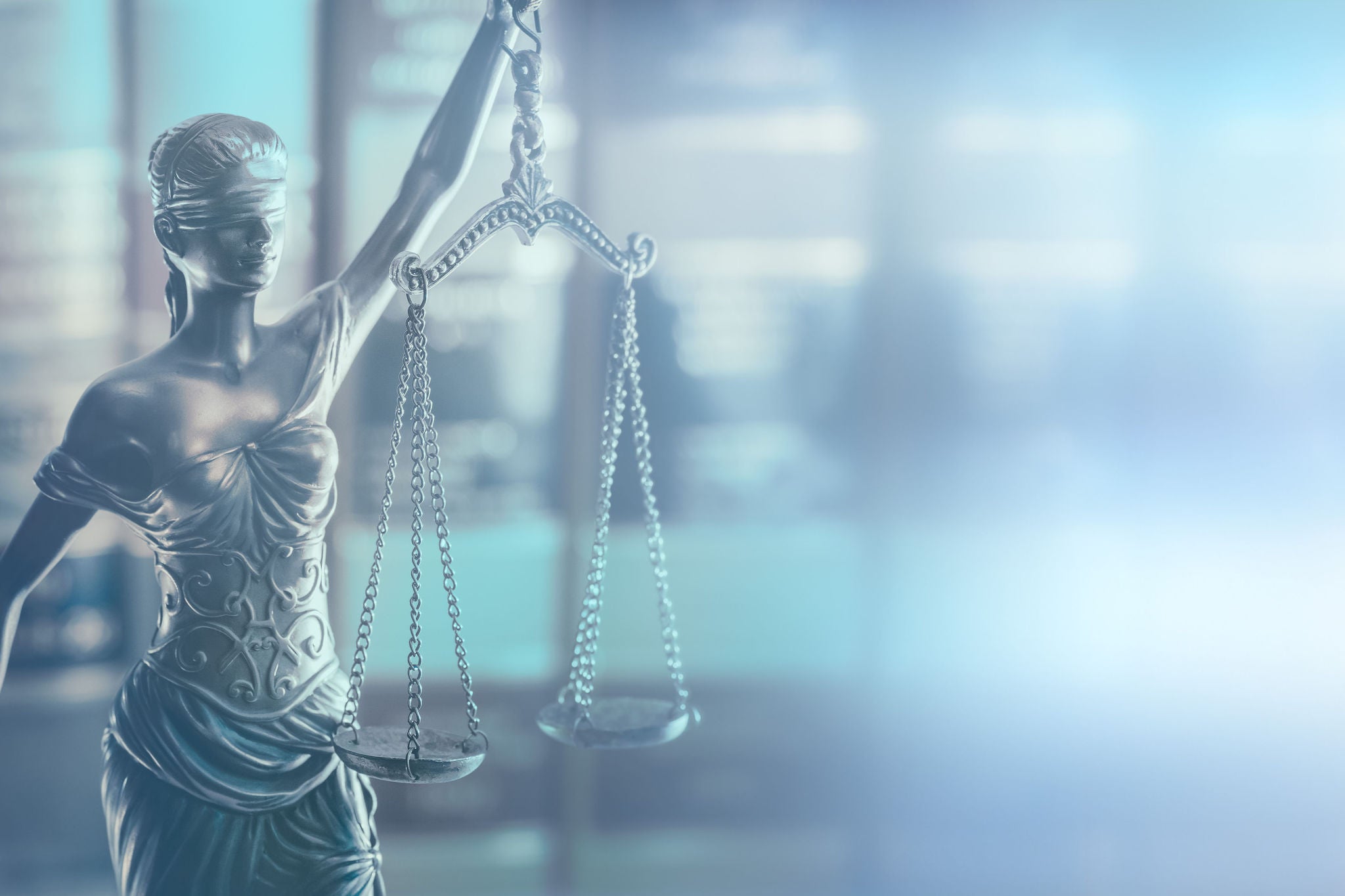 Scales of Justice  legal law books concept imagery 