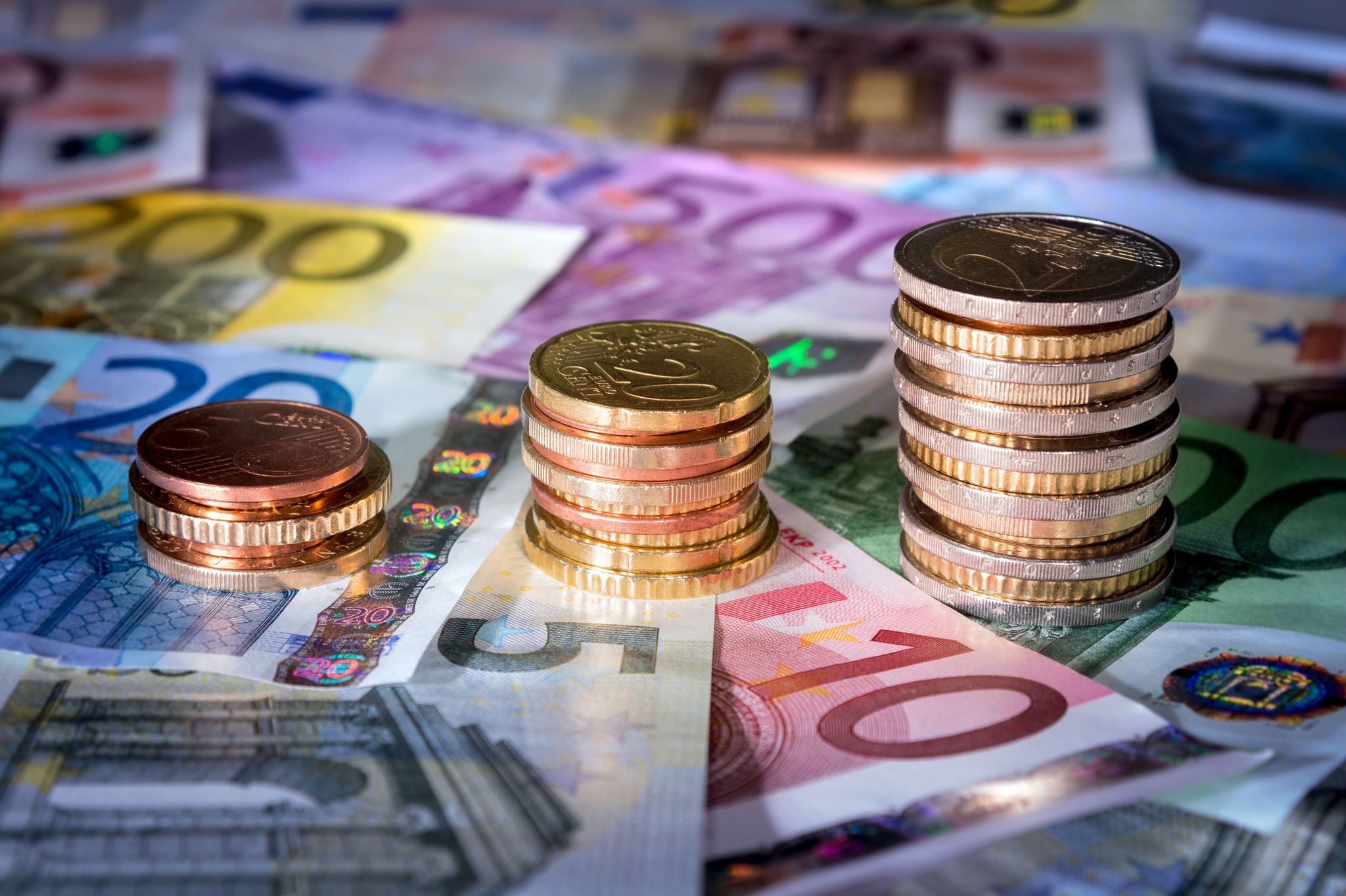 coins chart on euro banknotes
