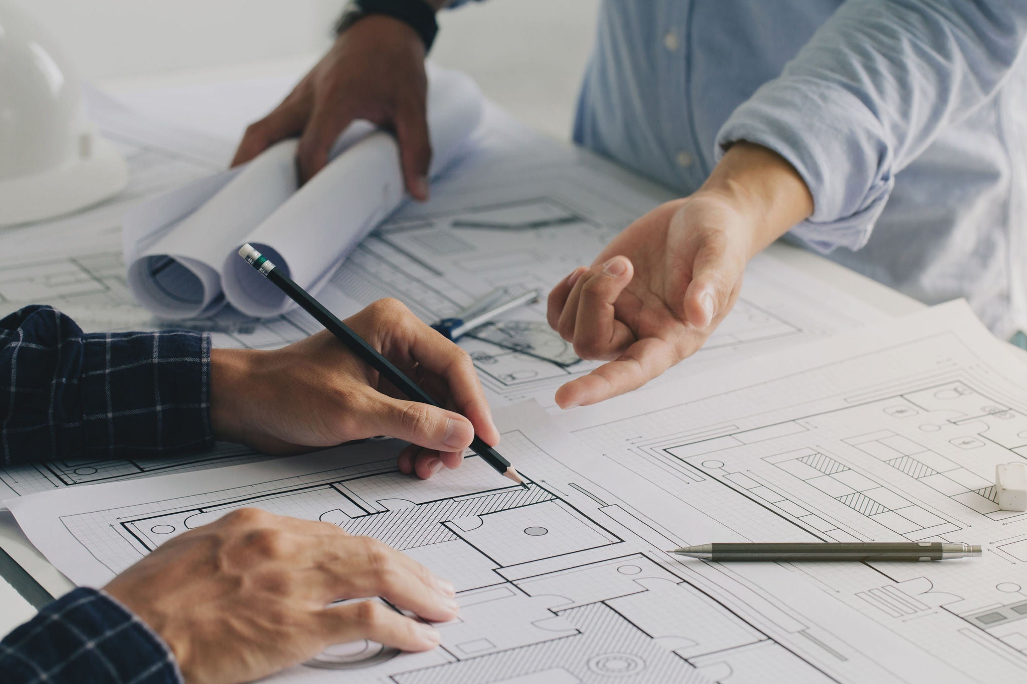 Two construction site engineers