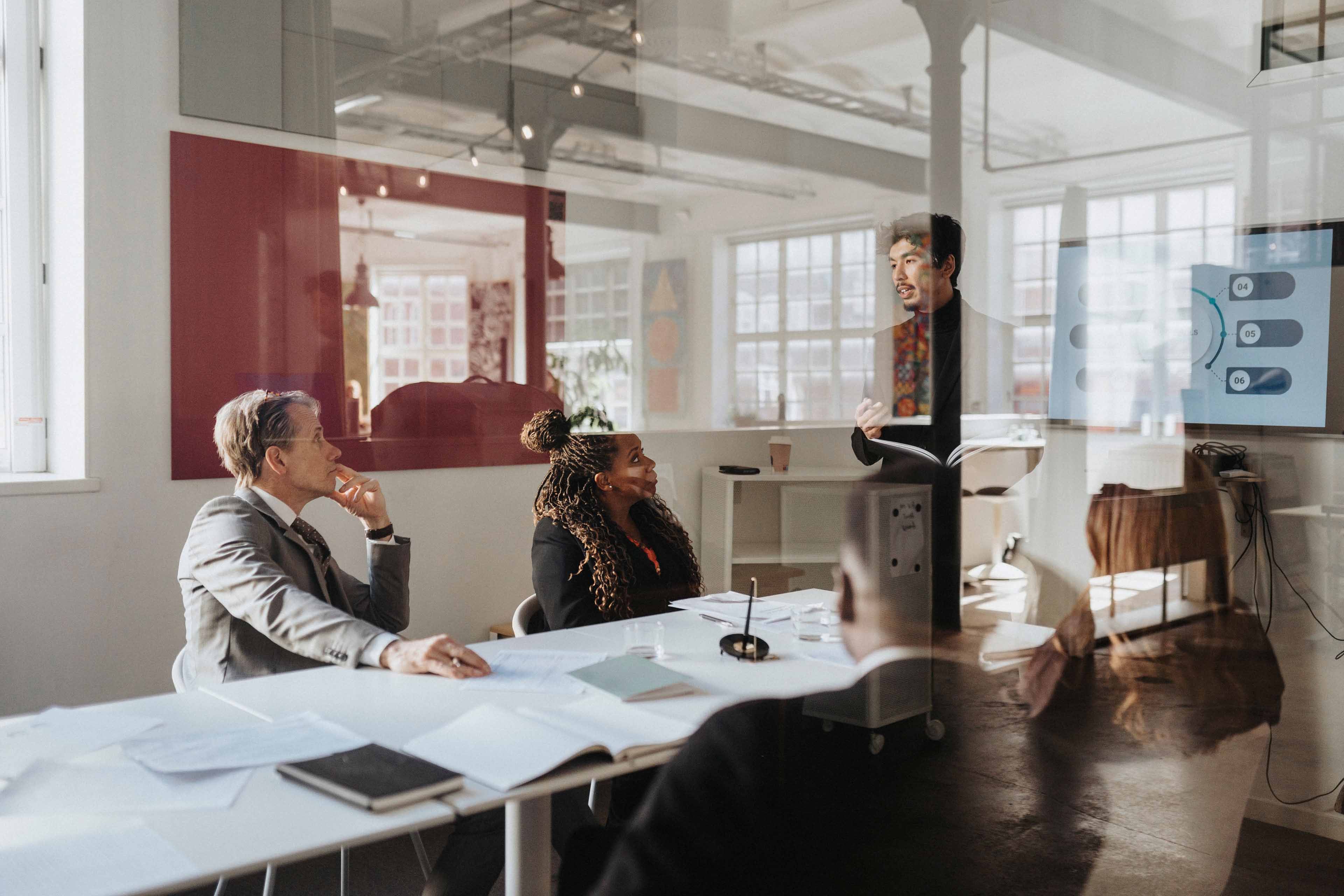 signing contract business agreement deal concept businessman signing official contract in modern office