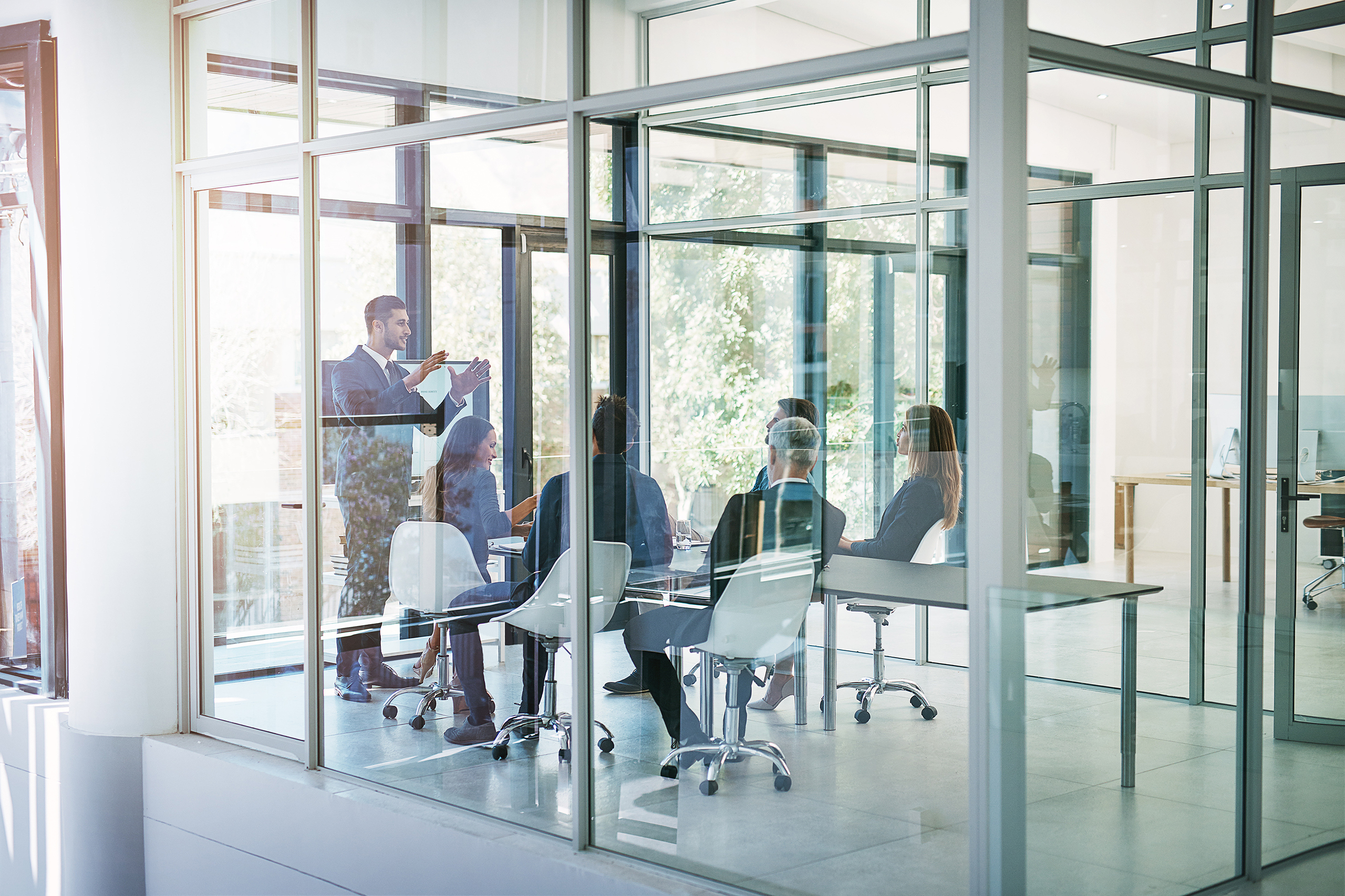 Business man, presentation and monitor in boardroom 
