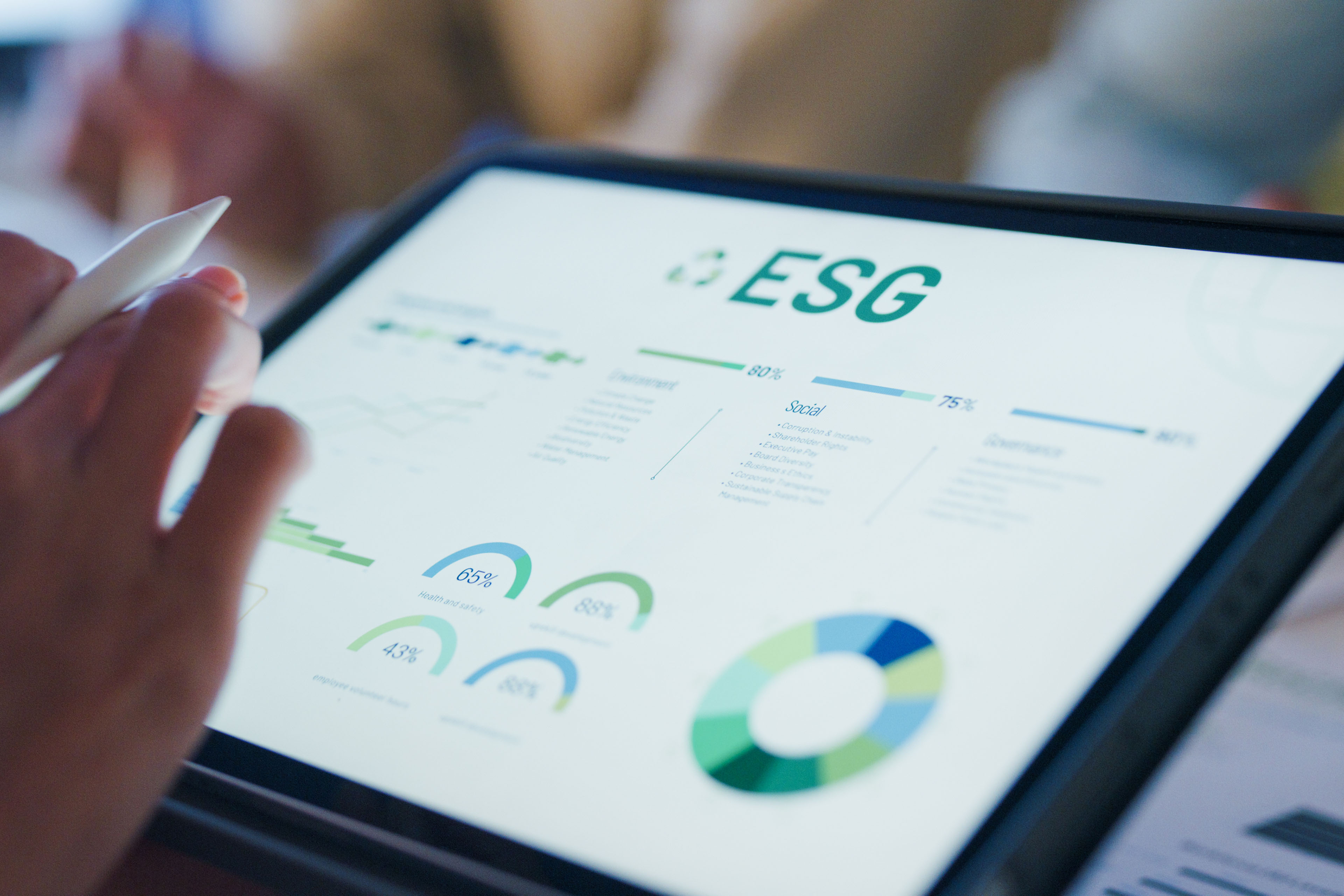 Closeup group businesspeople talk ESG strategies risk management workshop night